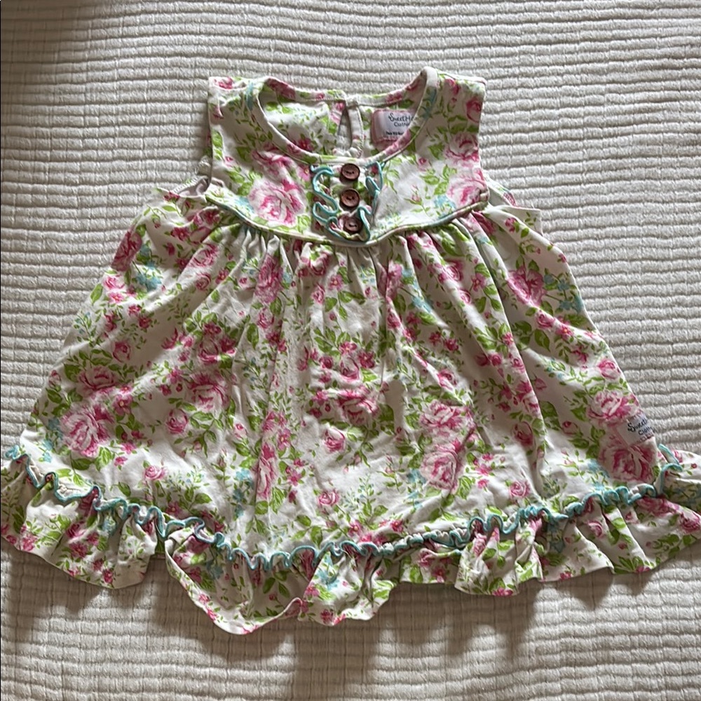 Floral Sleeveless Top with Ruffle Hem